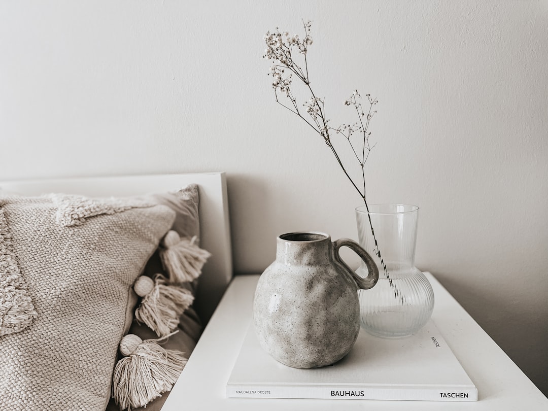 hero-01 white-ceramic-vase-on-white-book-37ysvsiubk